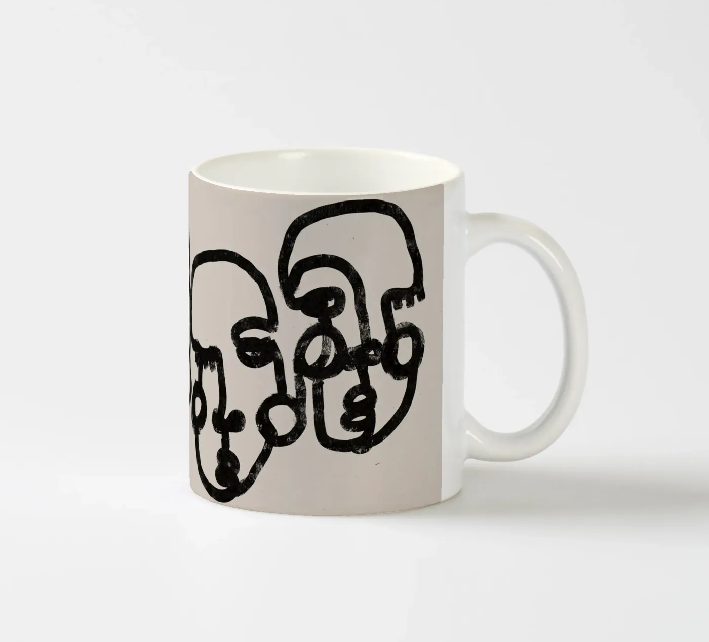 Four Faces ceramic mug by treechild