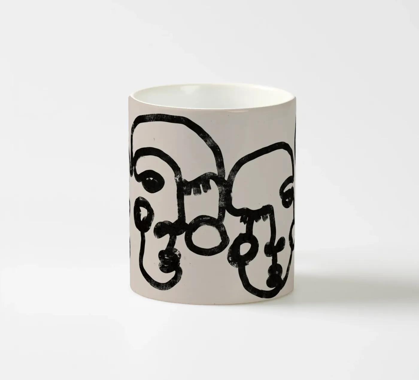 Four Faces ceramic mug by treechild