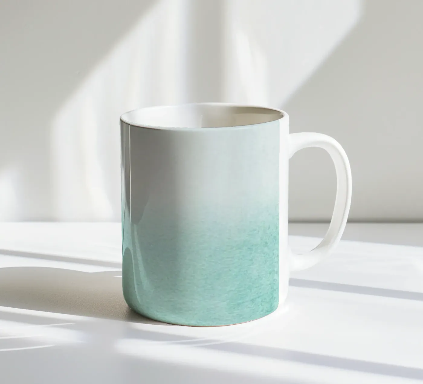 Fading Aqua ceramic mug by Monika Strigel