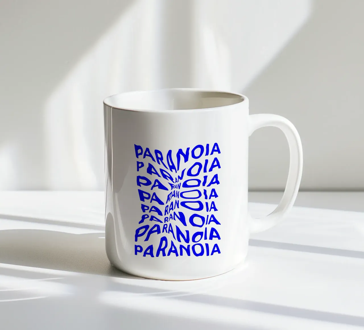 paranoia, optical illusion of liquid typography, statement l ceramic mug by The True Type