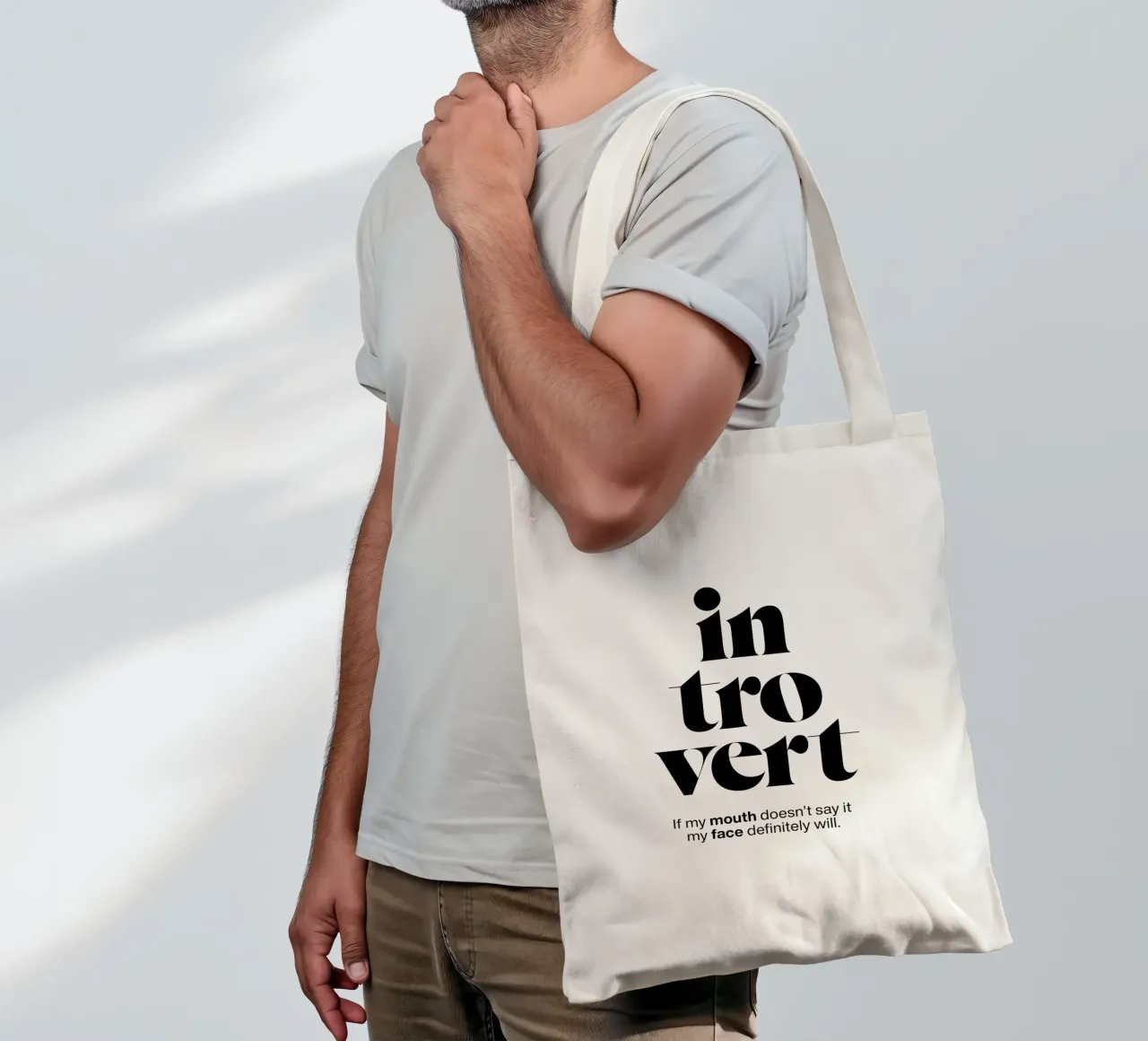 introvert: If my mouth doesn’t say it my face will tote bag by The True Type