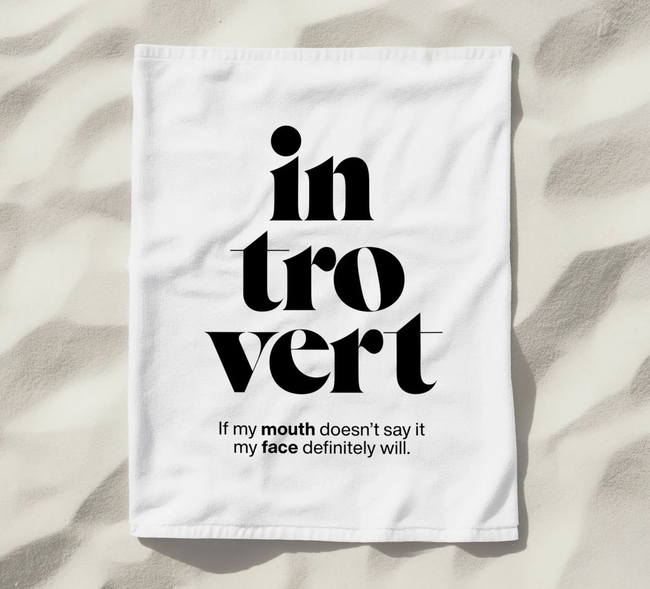 introvert: If my mouth doesn’t say it my face will beach towel by The True Type