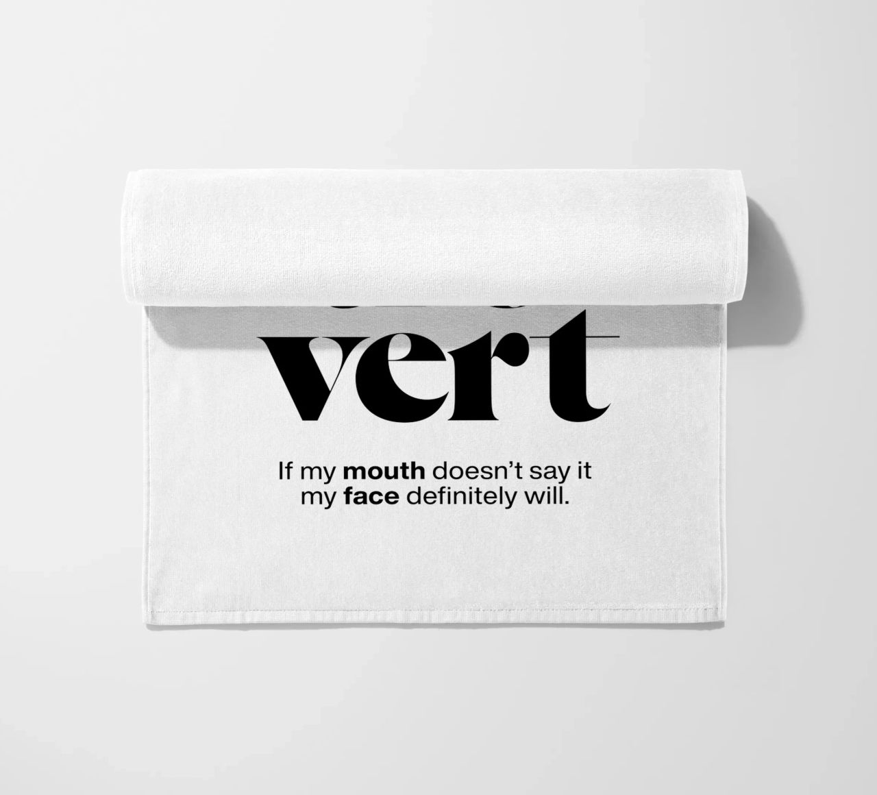 introvert: If my mouth doesn’t say it my face will beach towel by The True Type