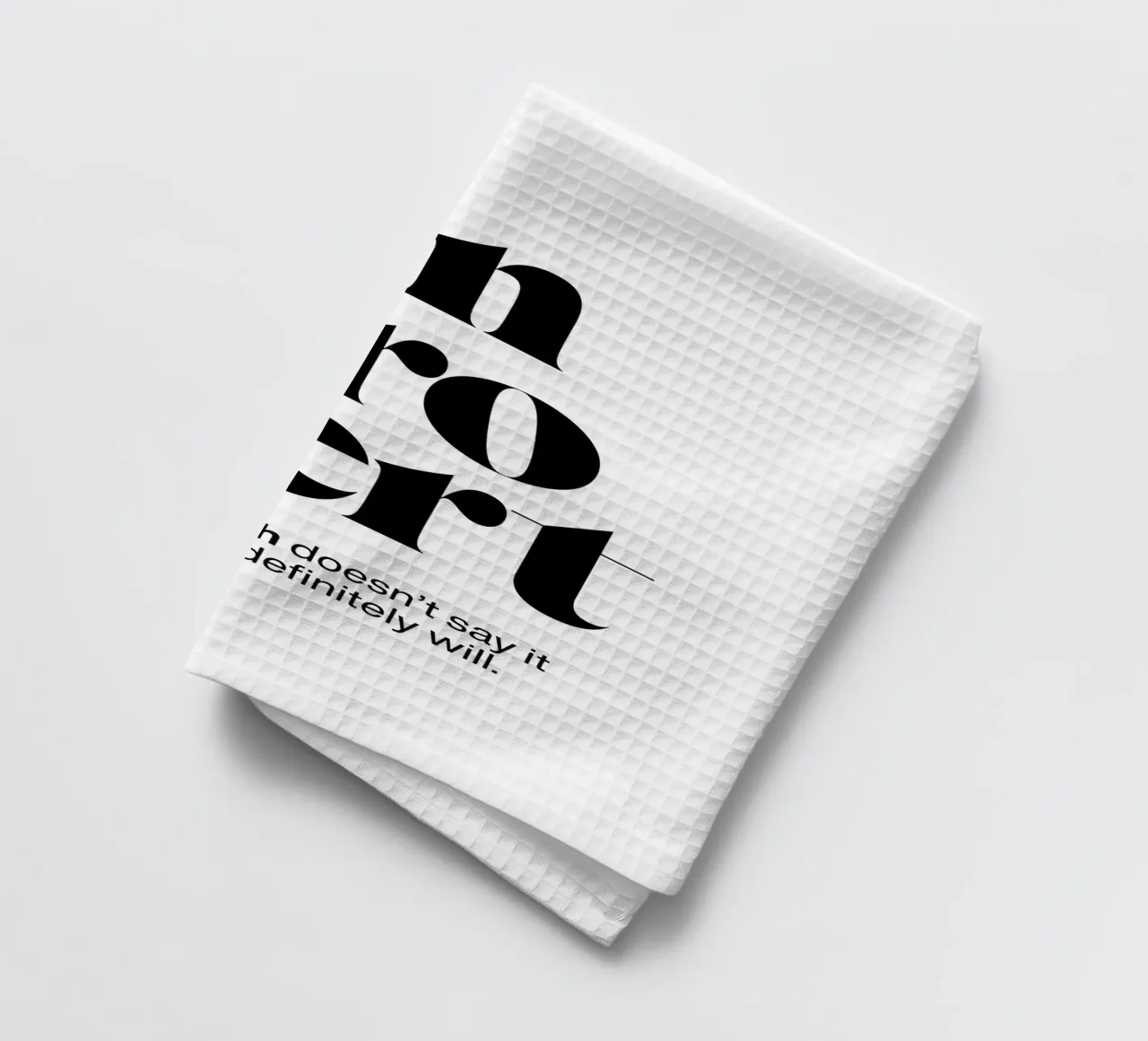 introvert: If my mouth doesn’t say it my face will tea towel by The True Type