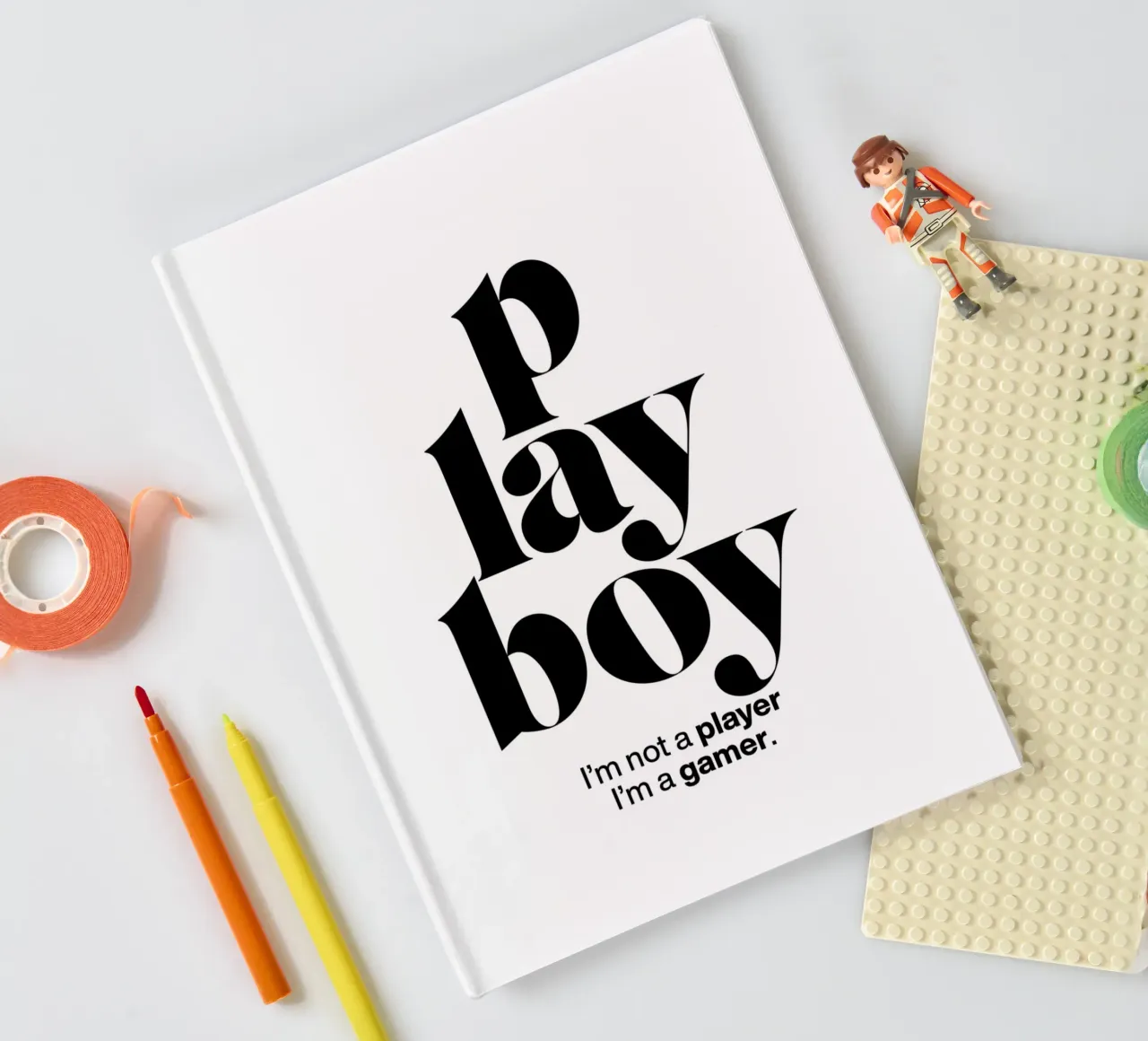 playboy statement print: I’m not a player, I’m a gamer. notebook by The True Type