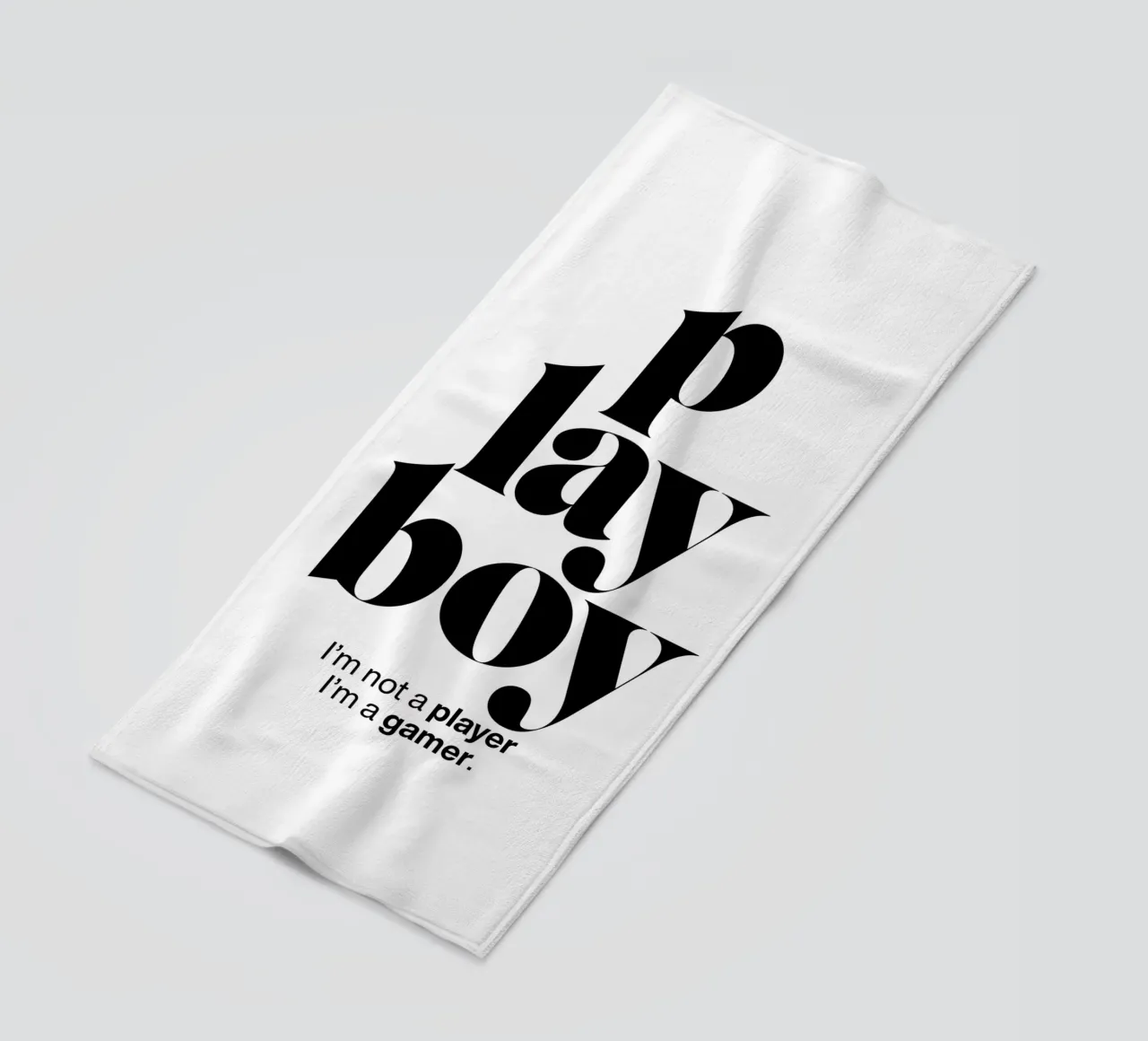 playboy statement print: I’m not a player, I’m a gamer. beach towel by The True Type