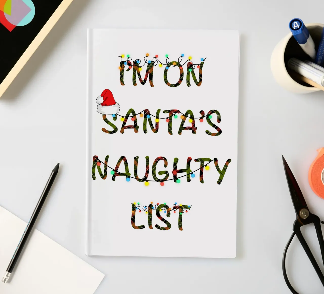 I'M ON SANTA'S NAUGHTY LIST notebook by ARTOMATIC