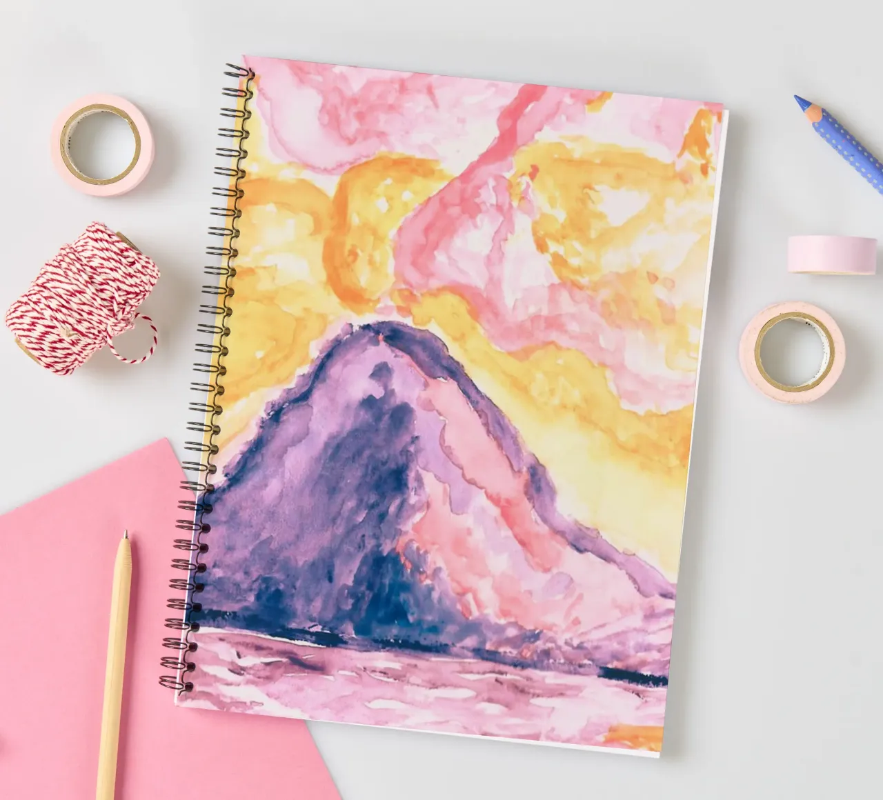 Mountains illuminated by the sunset ☀️ spiral notebook by Riry Duwaa