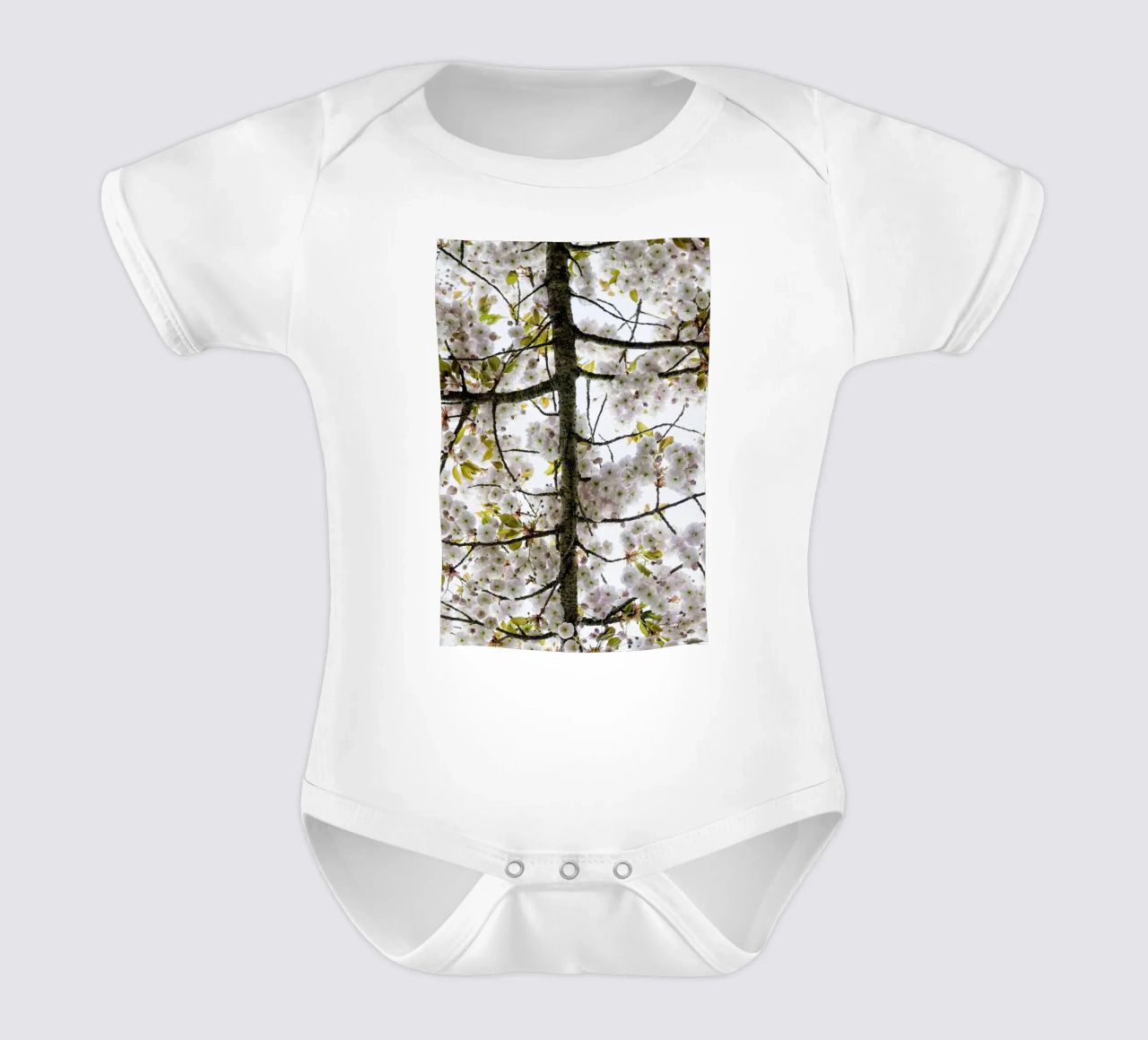 Underneath a Blossoming Tree body neonato maniche corte da Curious Collections by Marielle Leenders