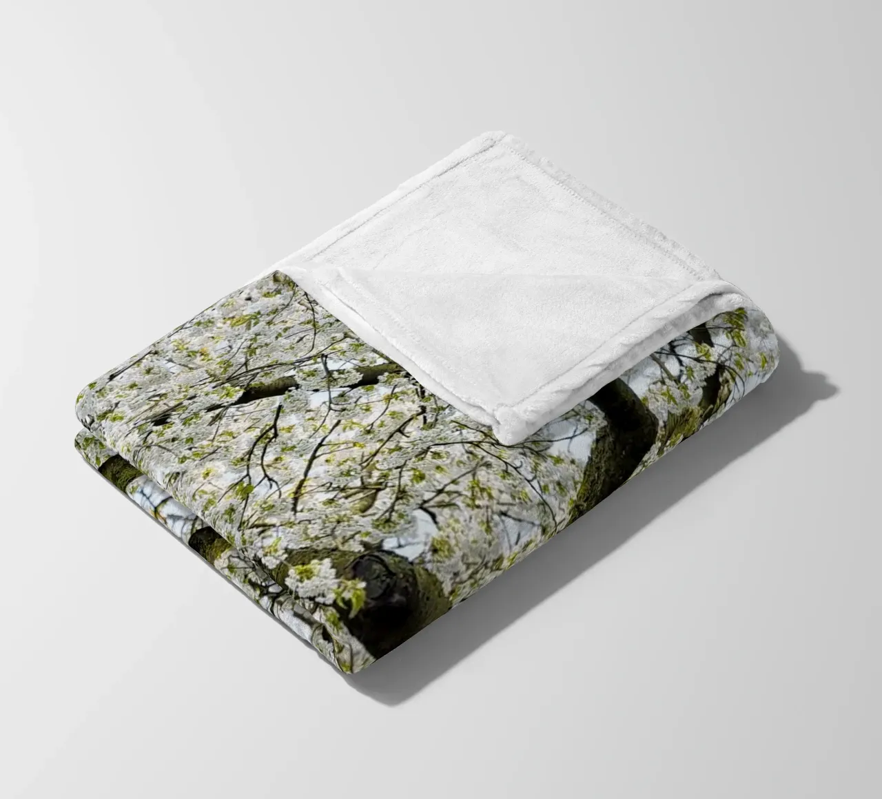 Tree with White Blossoms – A Peaceful Springtime Haven coperta in pile da Curious Collections by Marielle Leenders