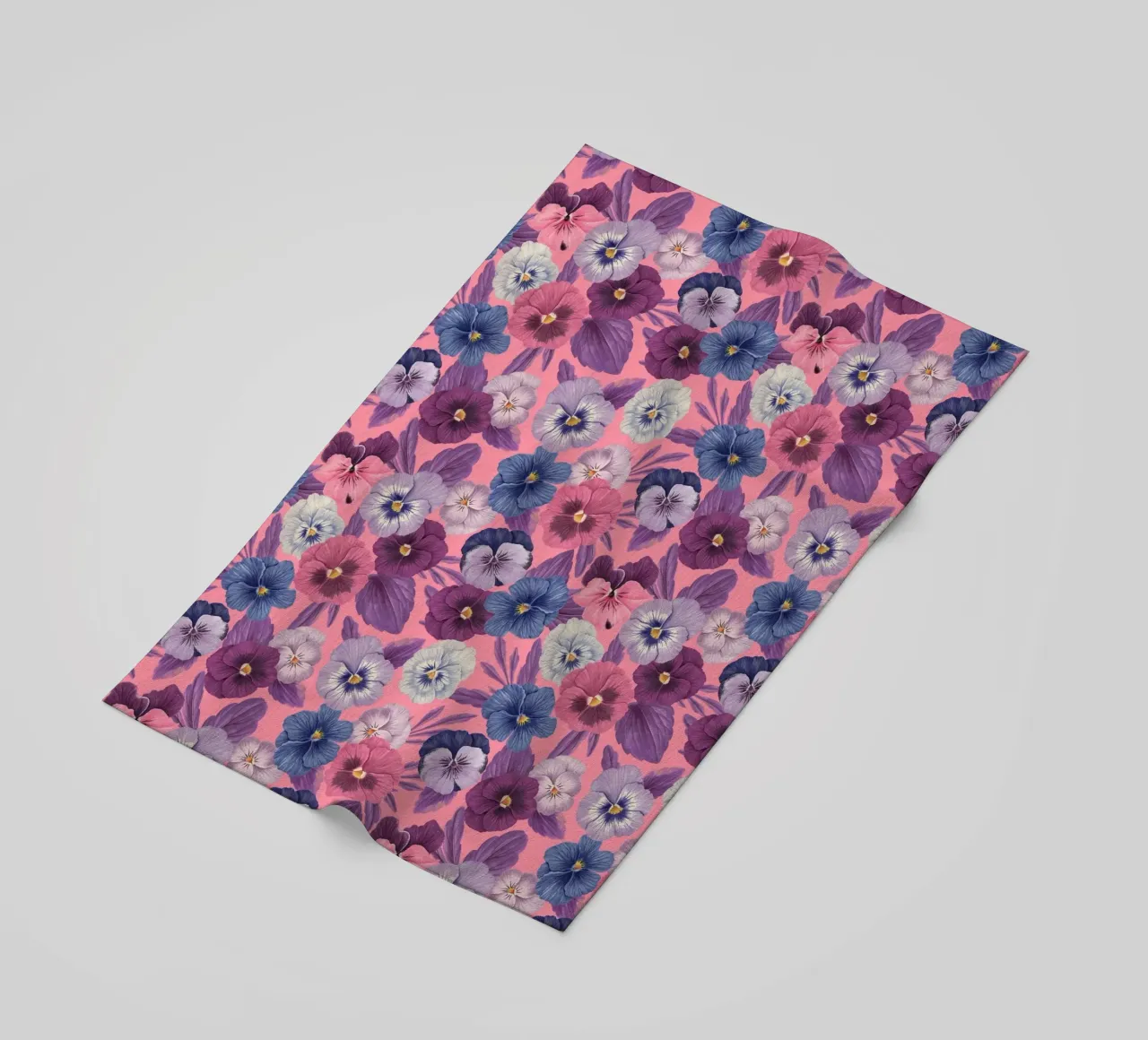 Colorful pansies on candy pink beach towel by Painted Nature