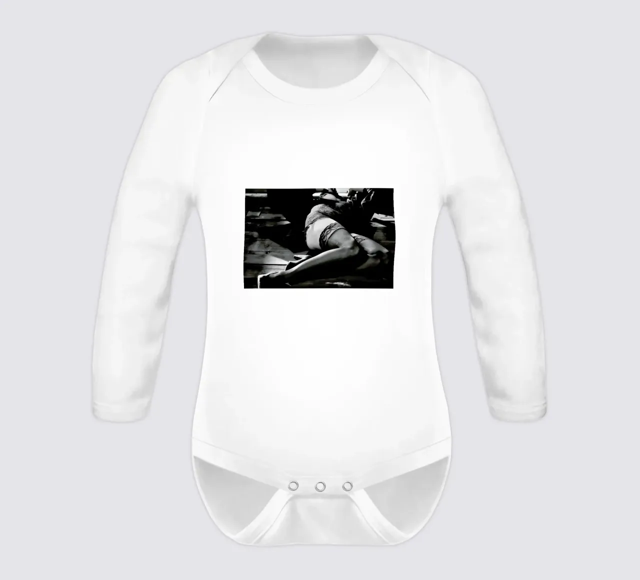 Used long-sleeve baby romper by Efacts Photography