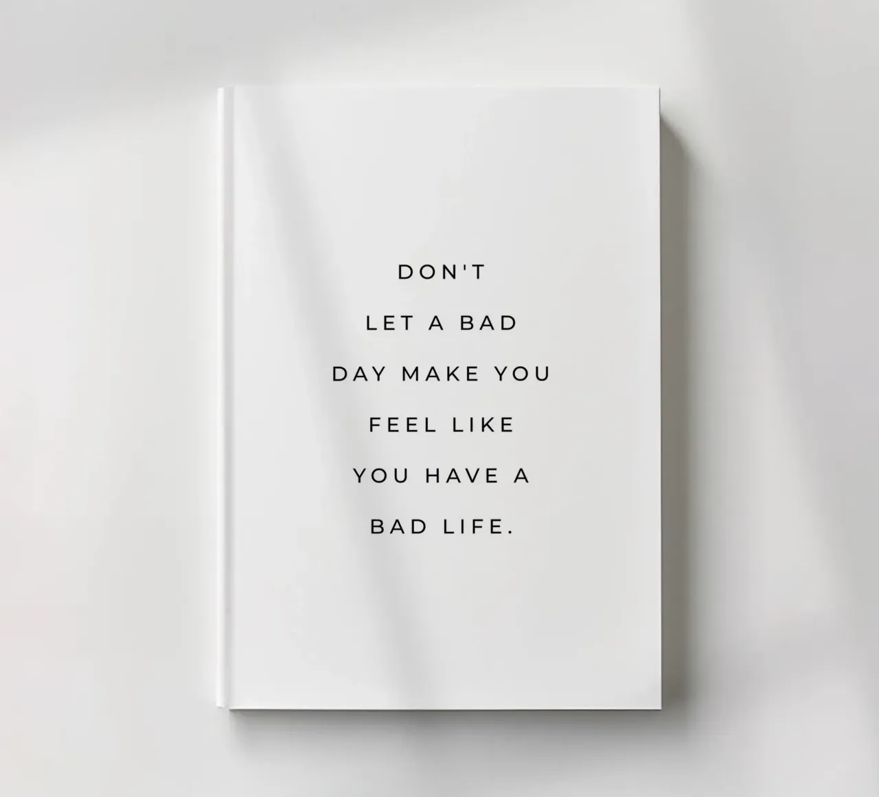 Don't let a bad day make you feel like quote notebook by Paigaam Studio