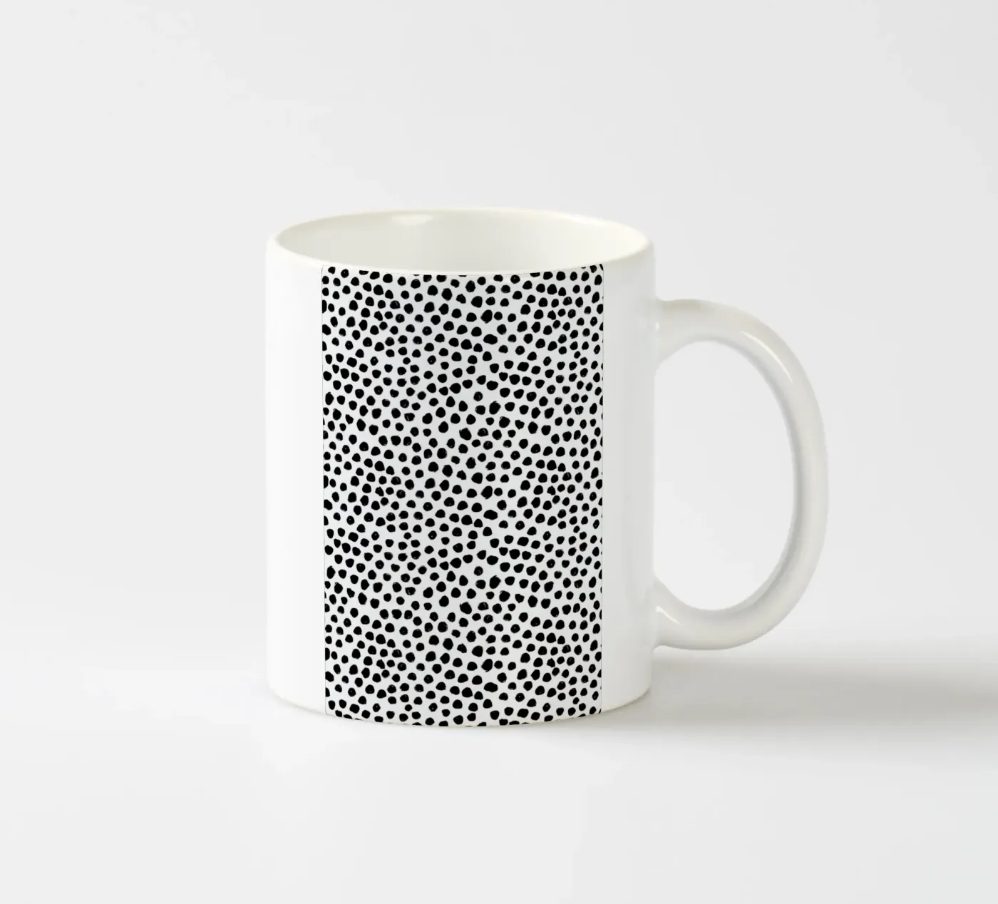 Small Dots ceramic mug by Niina Pechkovskaya
