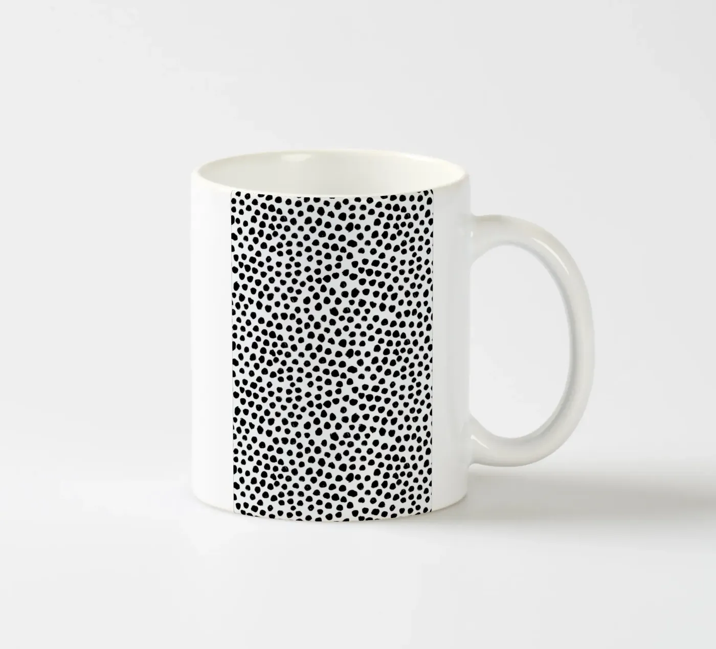 Small Dots tazza in ceramica da Niina Pechkovskaya