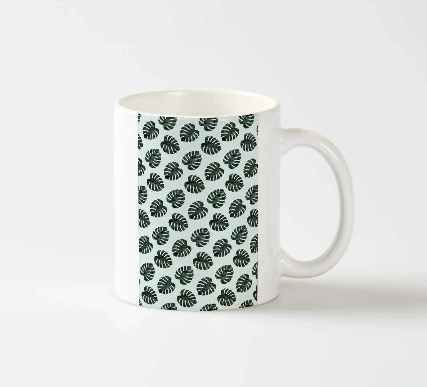 Monstera Pattern ceramic mug by Karin Bijlsma