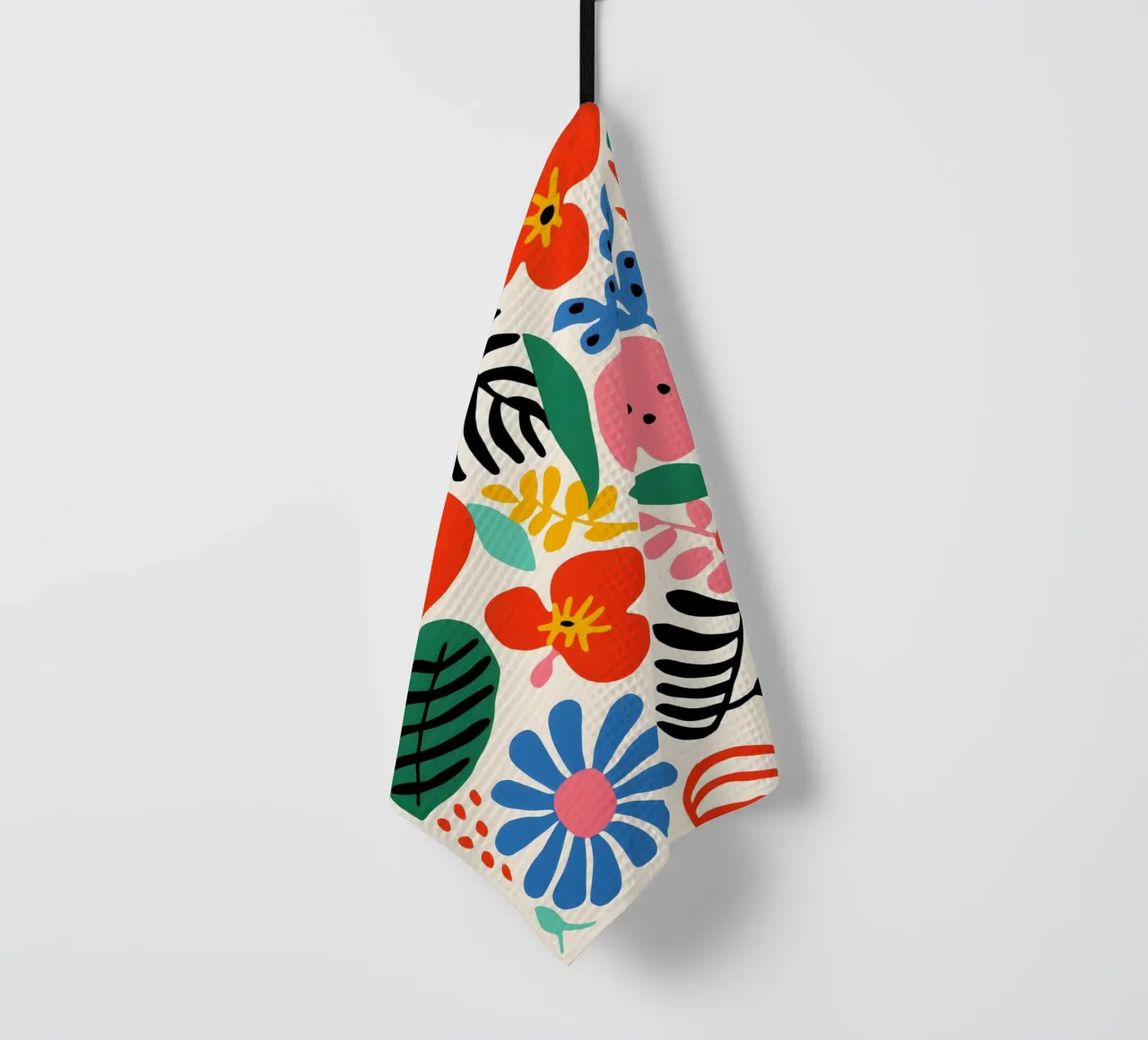 Colourful variety of flowers tea towel by Whole©