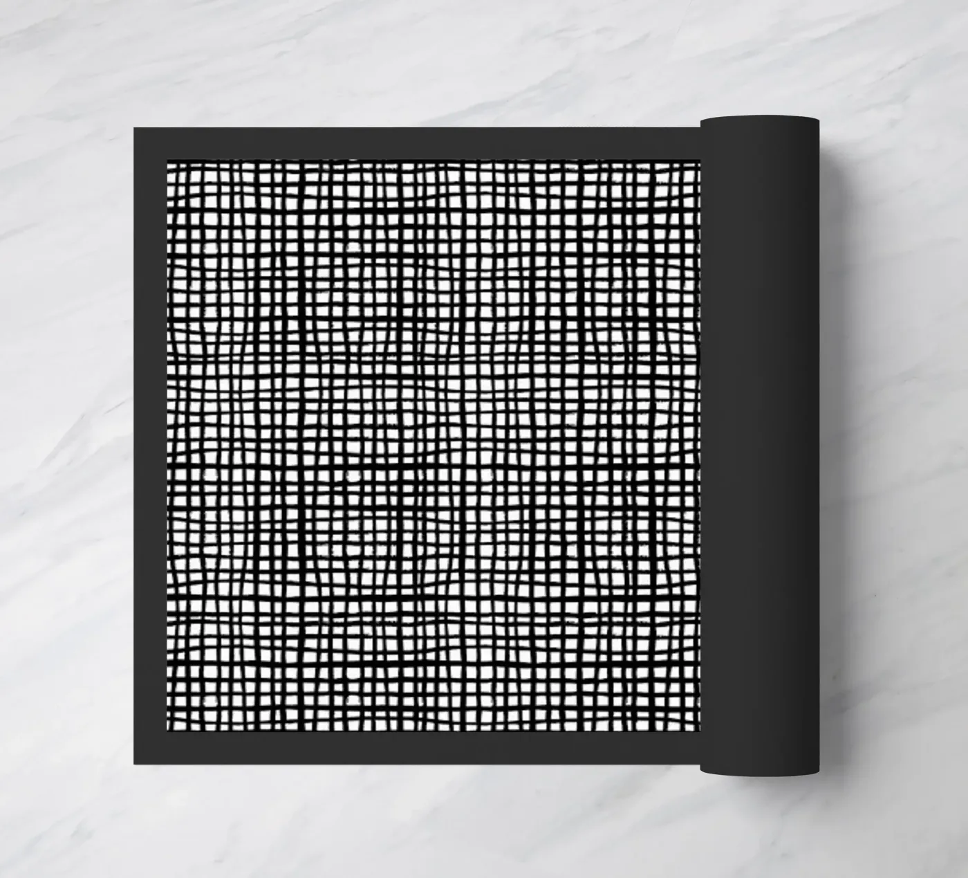Grid doormat by Charlotte Winter