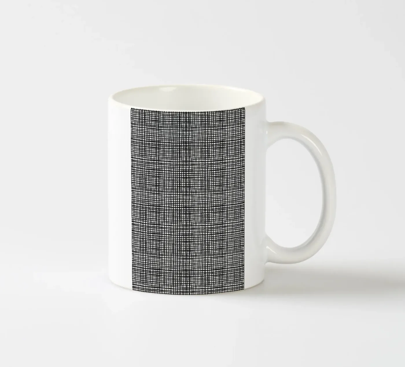 Grid ceramic mug by Charlotte Winter