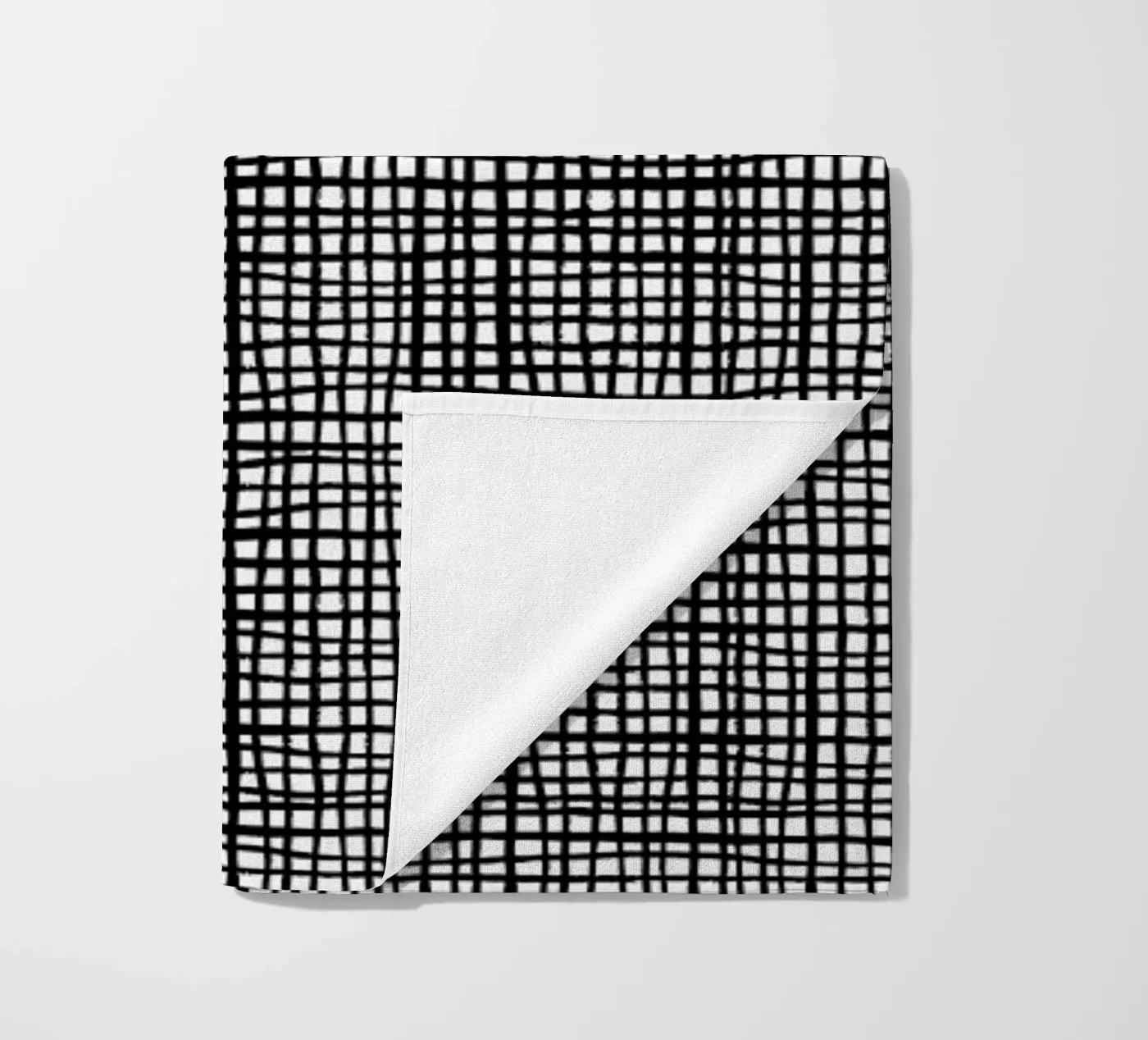 Grid strandhanddoek van Charlotte Winter