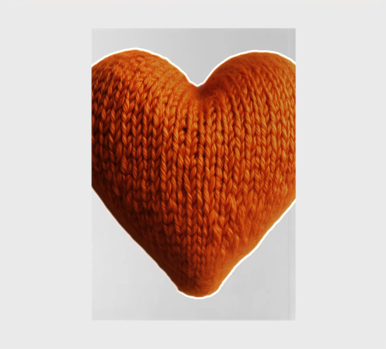 Cuore riscaldante a maglia arancione diario da Autofocus