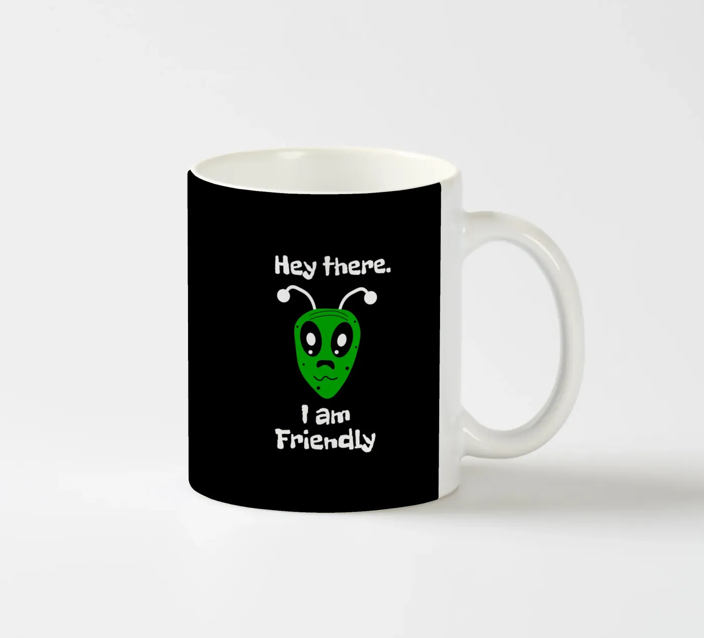 Friendly Alien ceramic mug by happieeagle