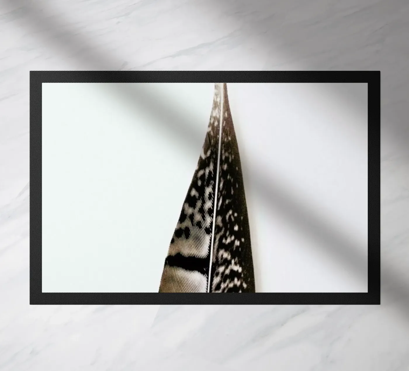 One Feather zerbino da Miles of Light