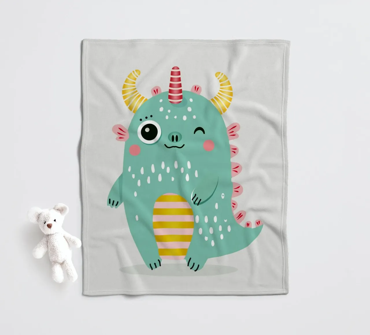 Simpatico mostro con corna colorate coperta in pile da namosh