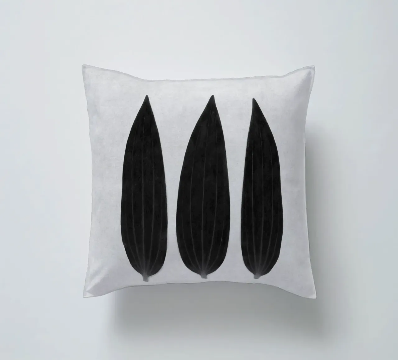 three of a kind decorative cushion by Visuelle Poesie am Wegesrand