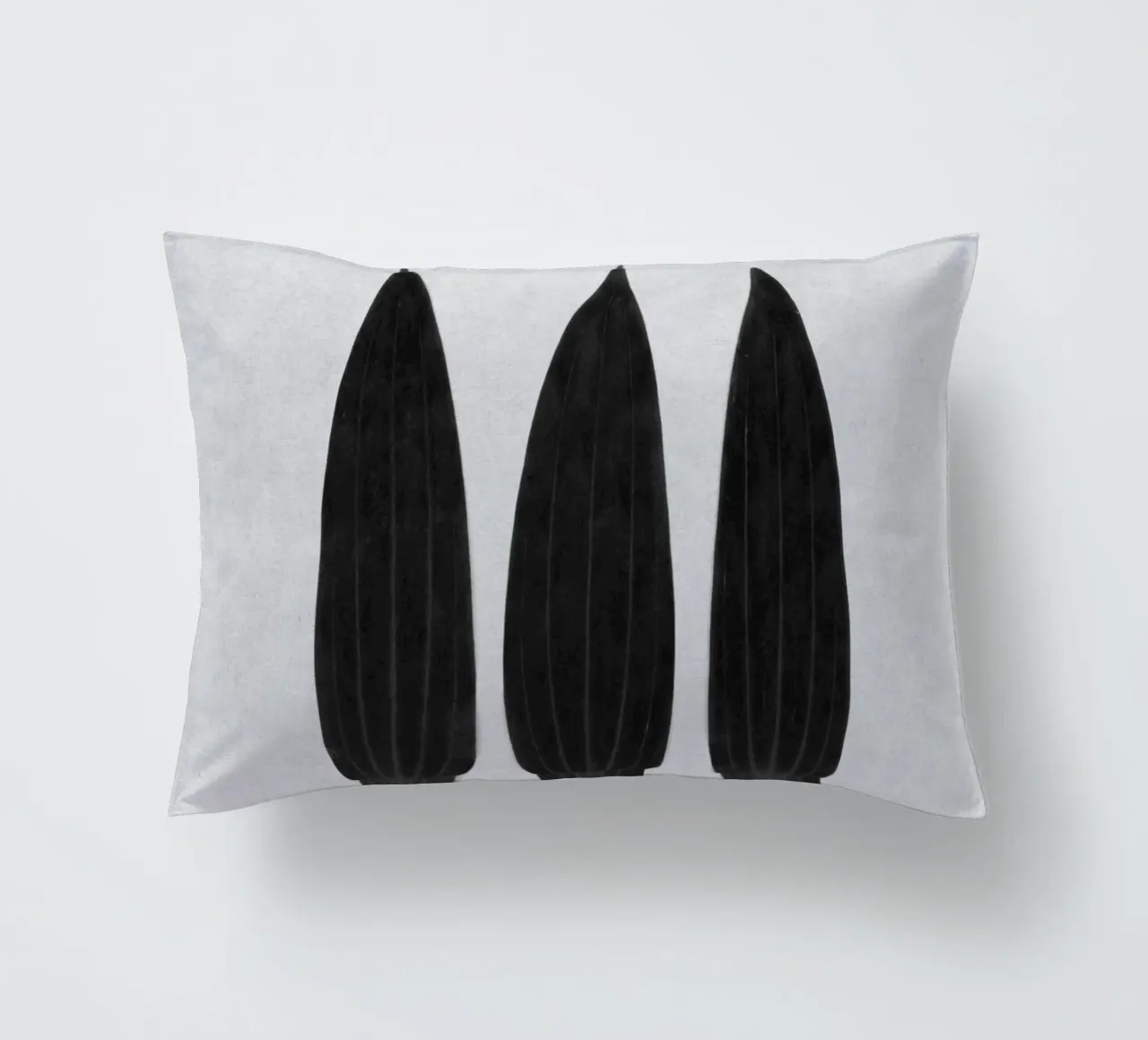 three of a kind decorative cushion by Visuelle Poesie am Wegesrand