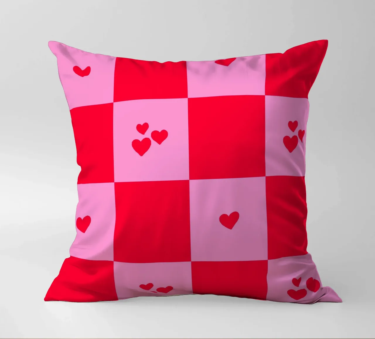 Grid heart pattern - pink and red decorative cushion by Wackapacka