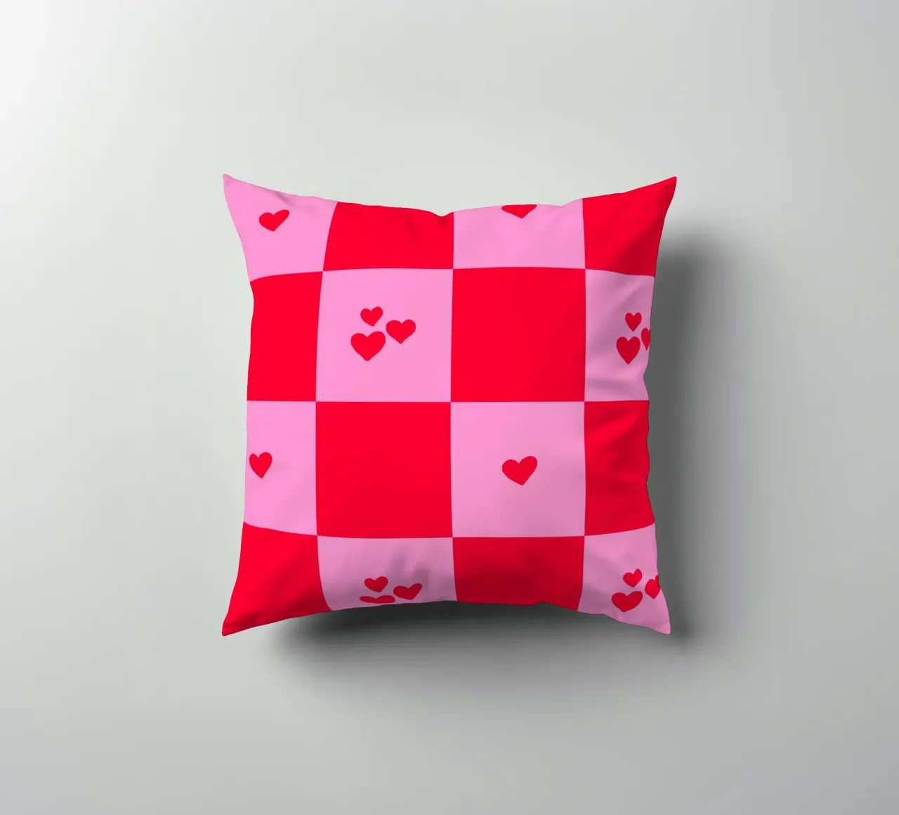 Grid heart pattern - pink and red decorative cushion by Wackapacka