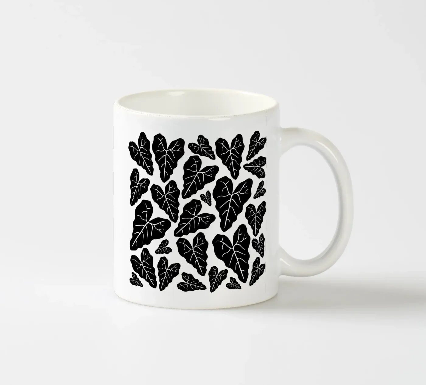 Black leaves pattern ceramic mug by baobabprintstore