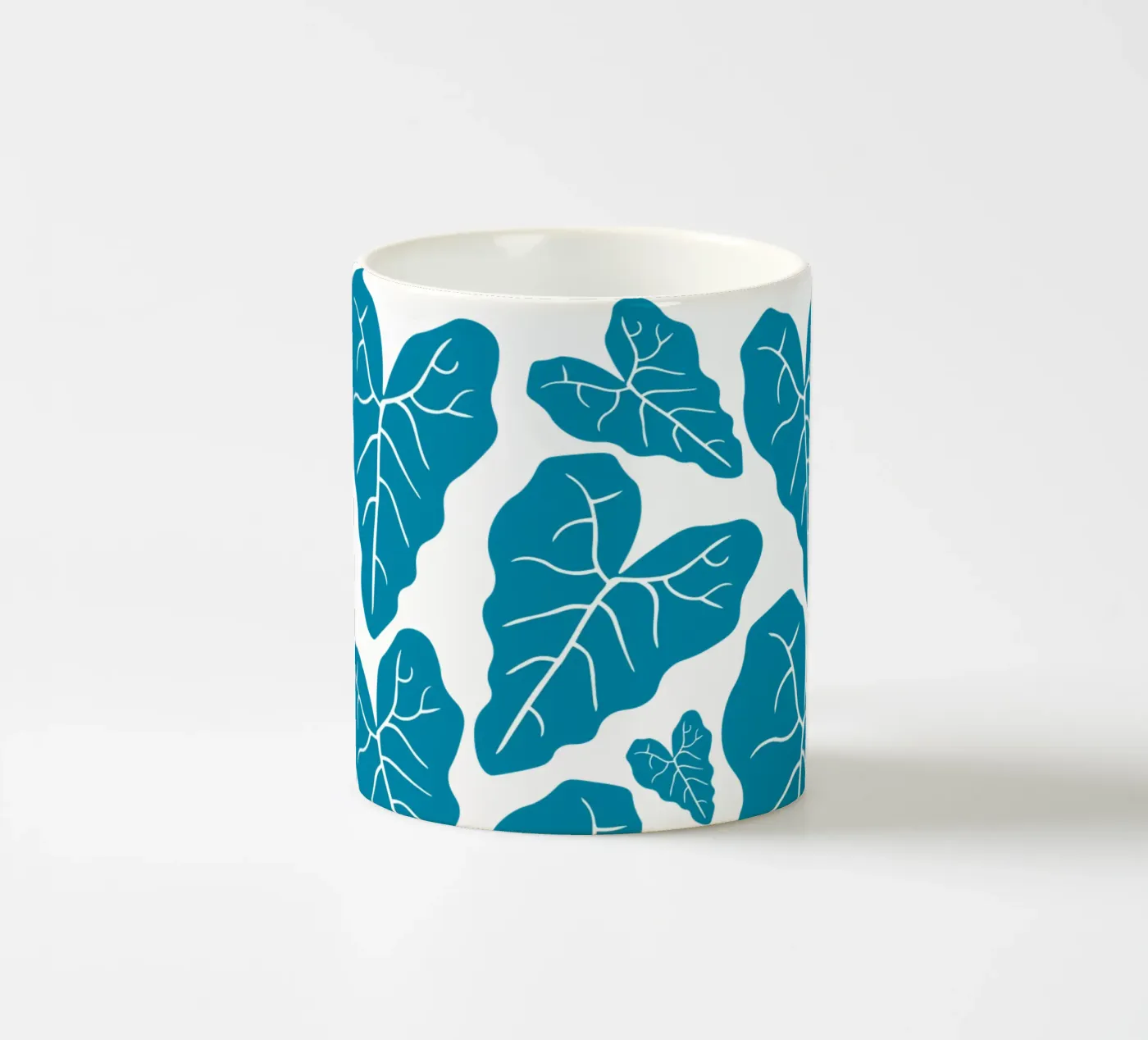 Blue leaves pattern ceramic mug by baobabprintstore