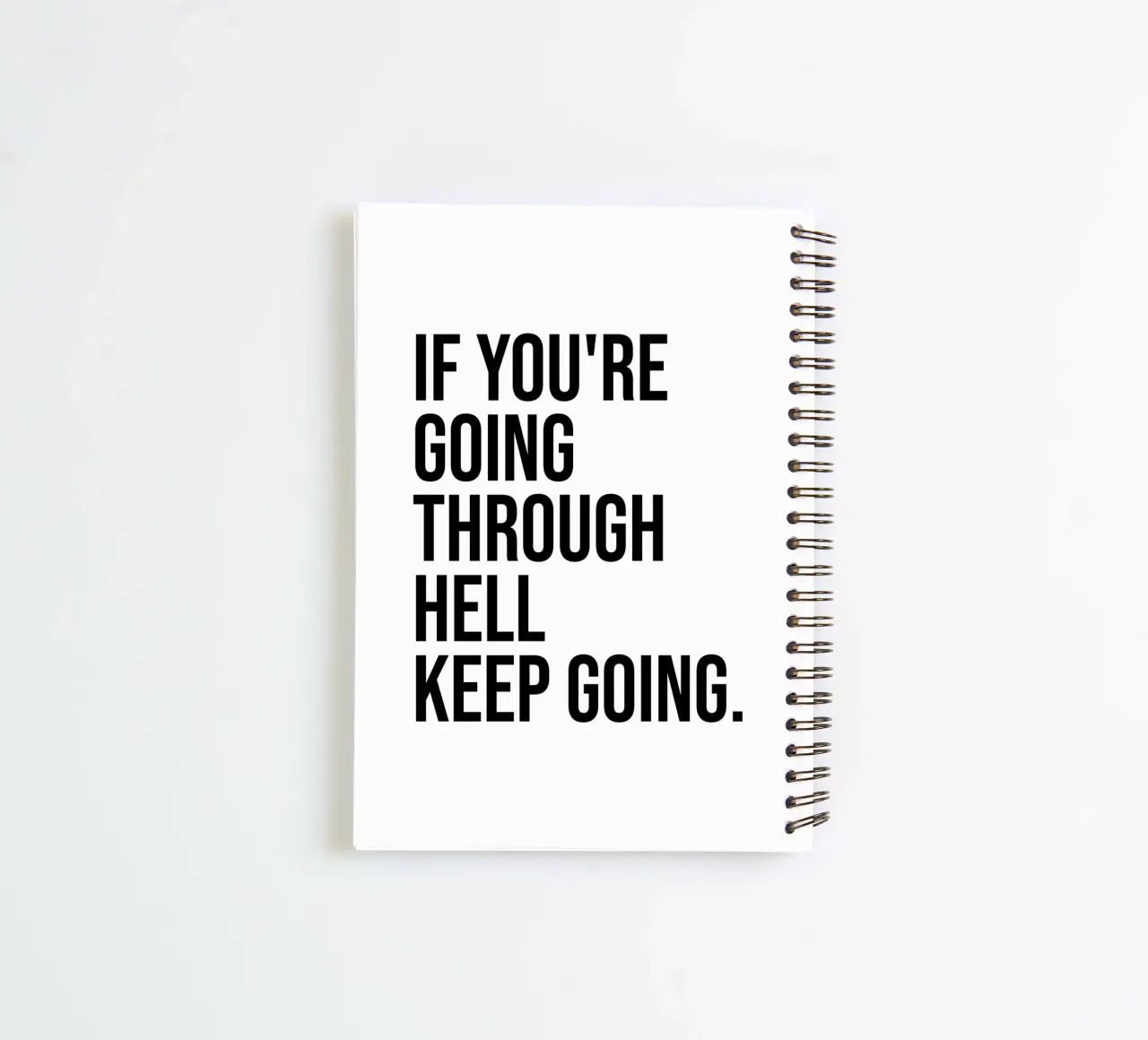If you're going through hell keep going quote spiral notebook by Paigaam Studio