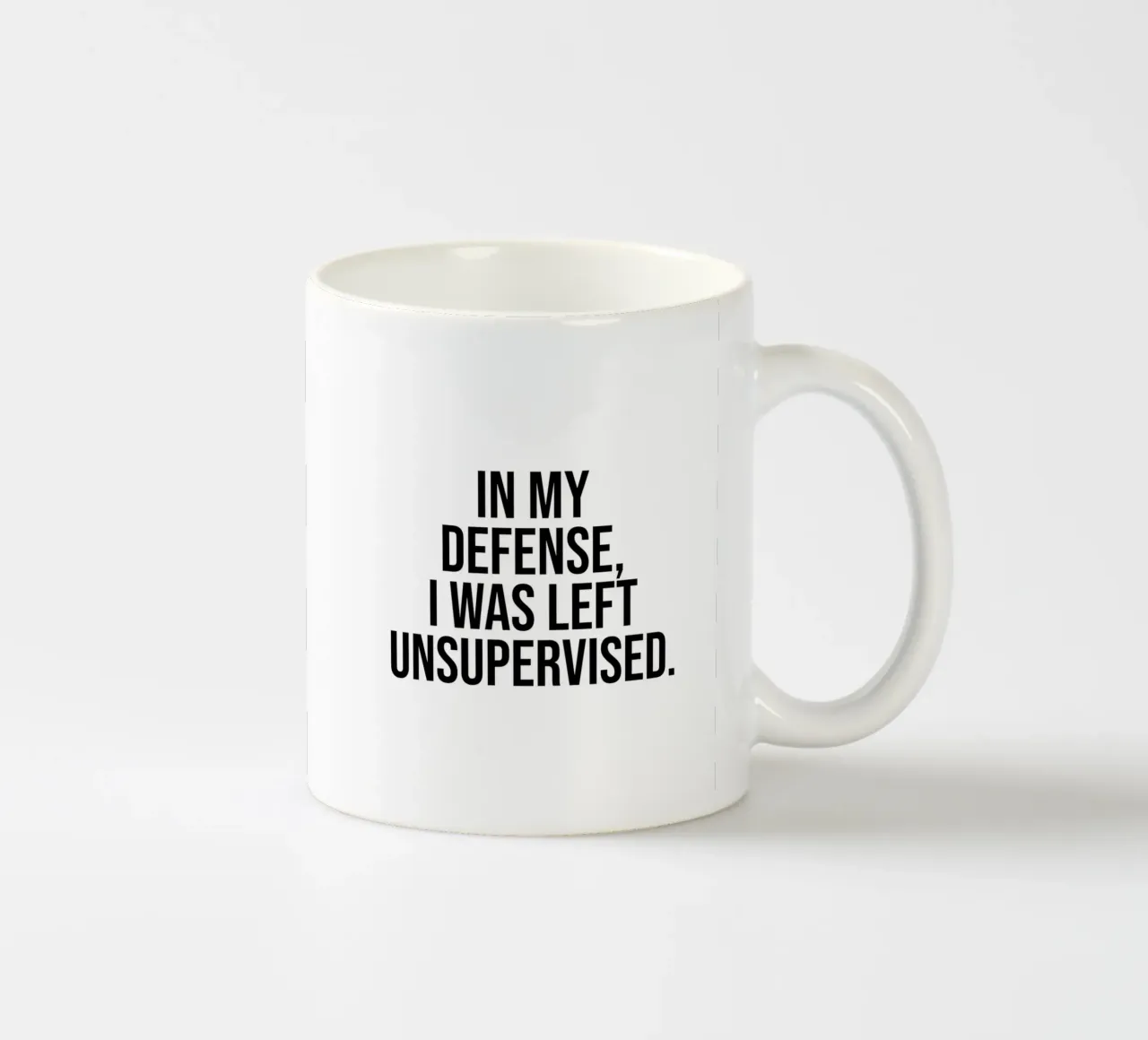 In my defense, I was left unsupervised quote ceramic mug by Paigaam Studio