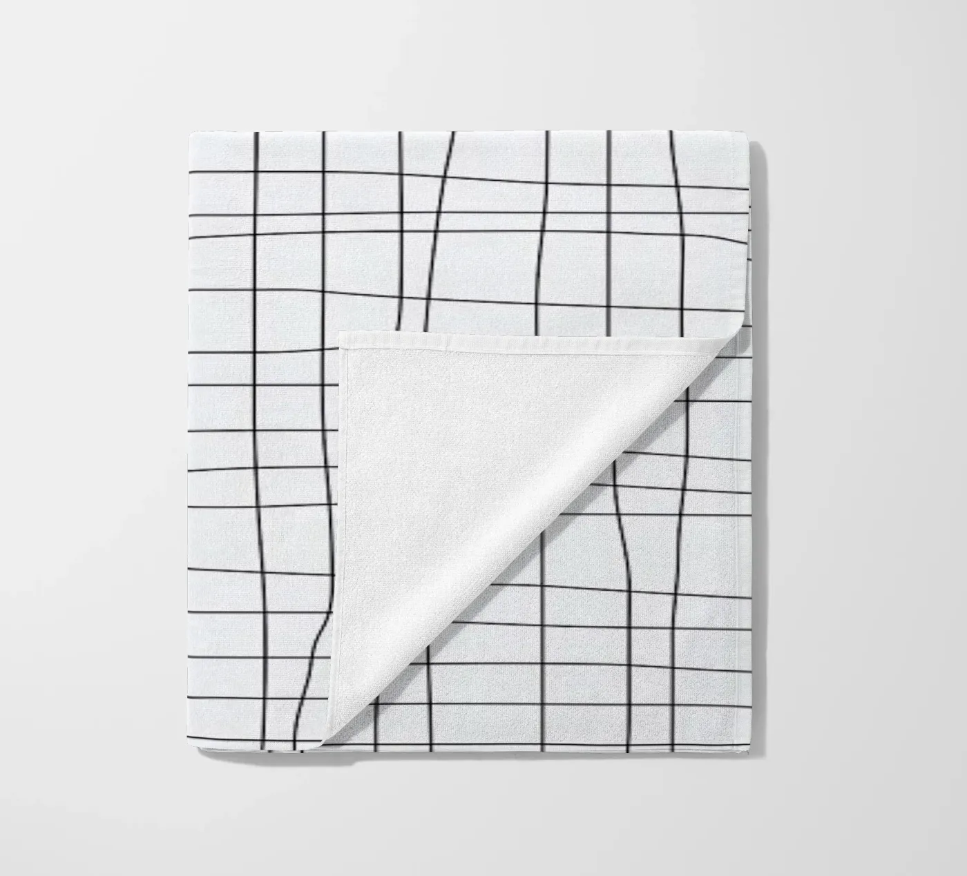 Grid beach towel by Studio Nahili