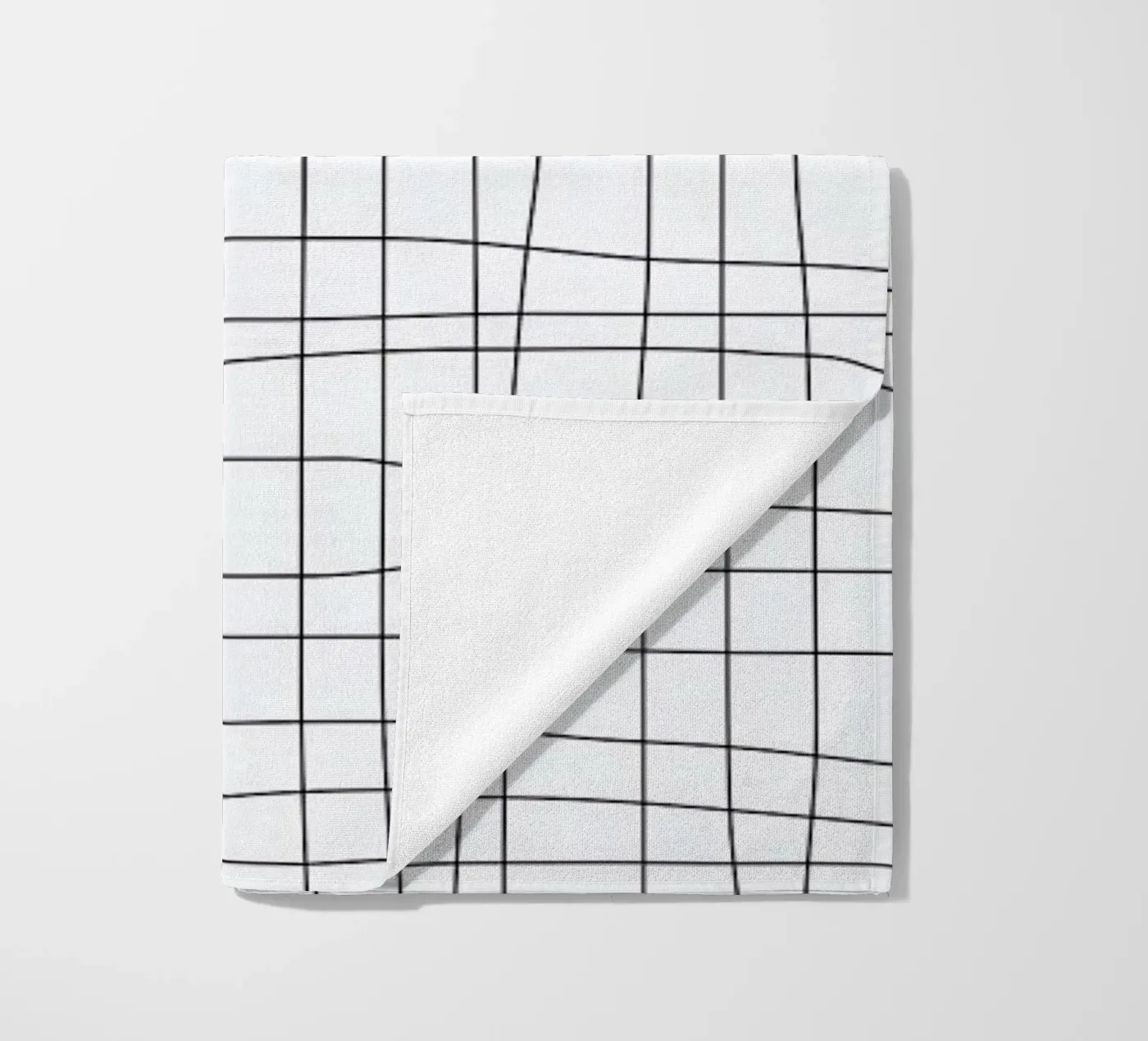 Grid beach towel by Studio Nahili