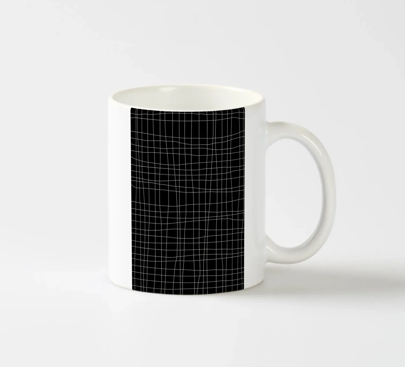 Grid Black ceramic mug by Studio Nahili