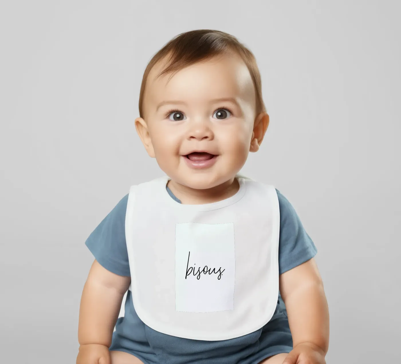 Bisous baby bib by Honeymoon Hotel