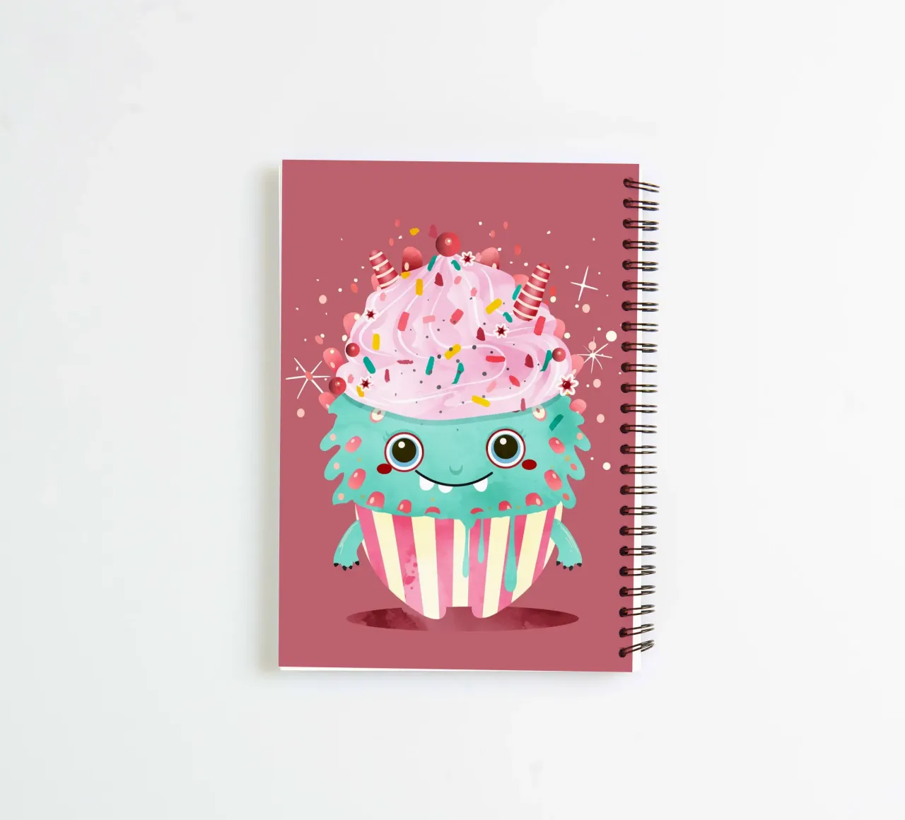 Cupcake monster motif with colourful icing & sprinkles spiral notebook by namosh