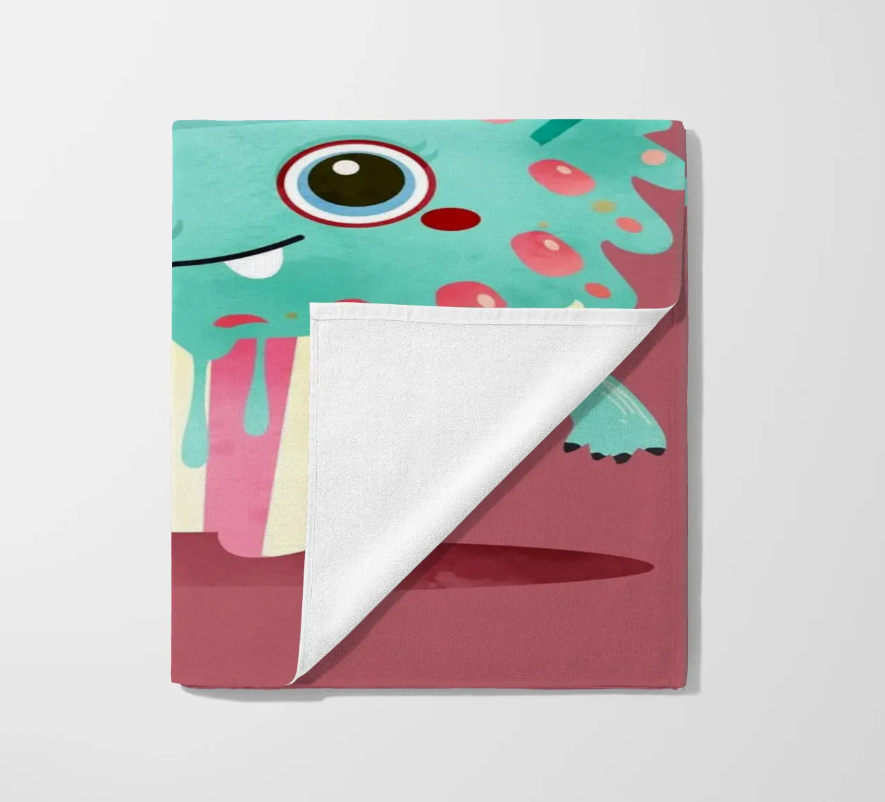 Cupcake monster motif with colourful icing & sprinkles beach towel by namosh