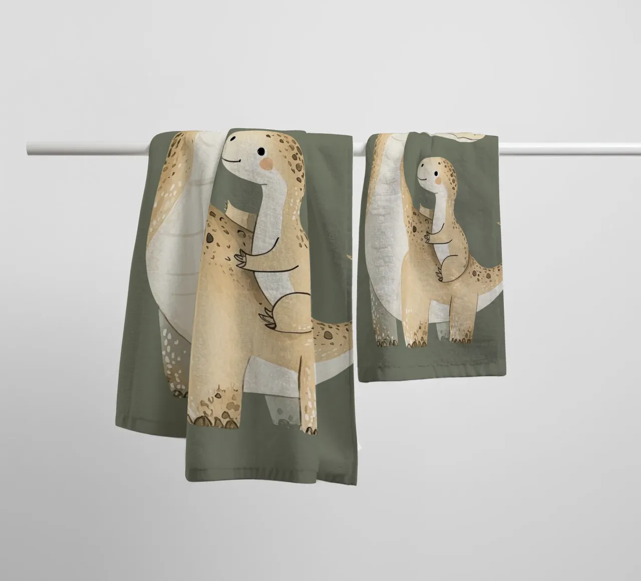 Illustrazione di dinosauri e covoni, stampa per l'asilo nido asciugamano da bagno da Little Lola