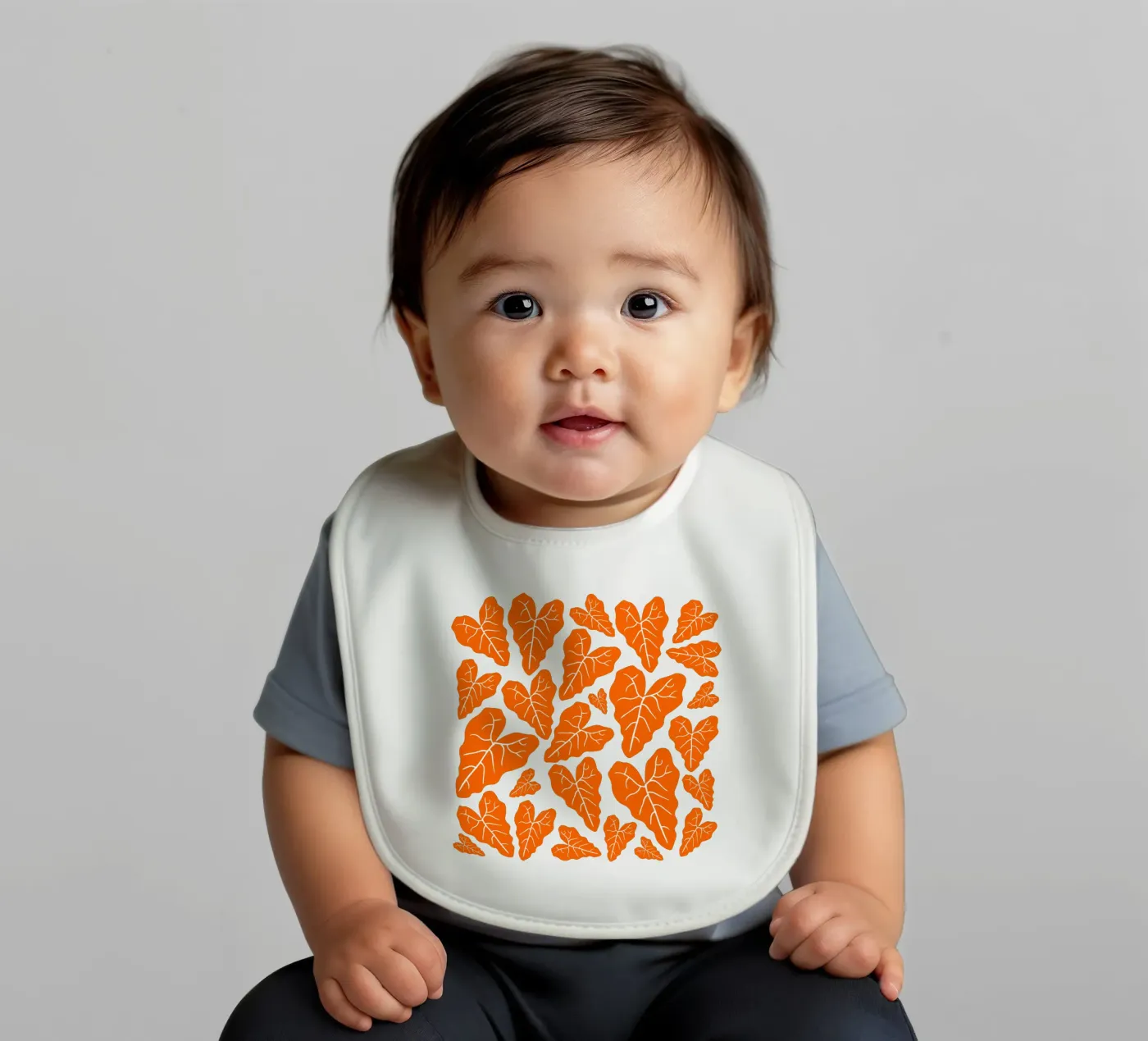Orange leaves pattern baby slabbetje van baobabprintstore