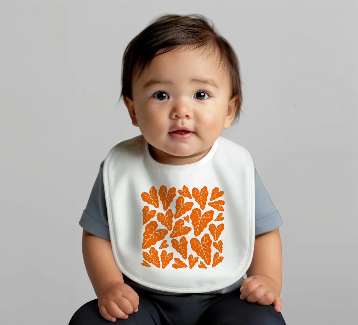 Orange leaves pattern baby slabbetje van baobabprintstore