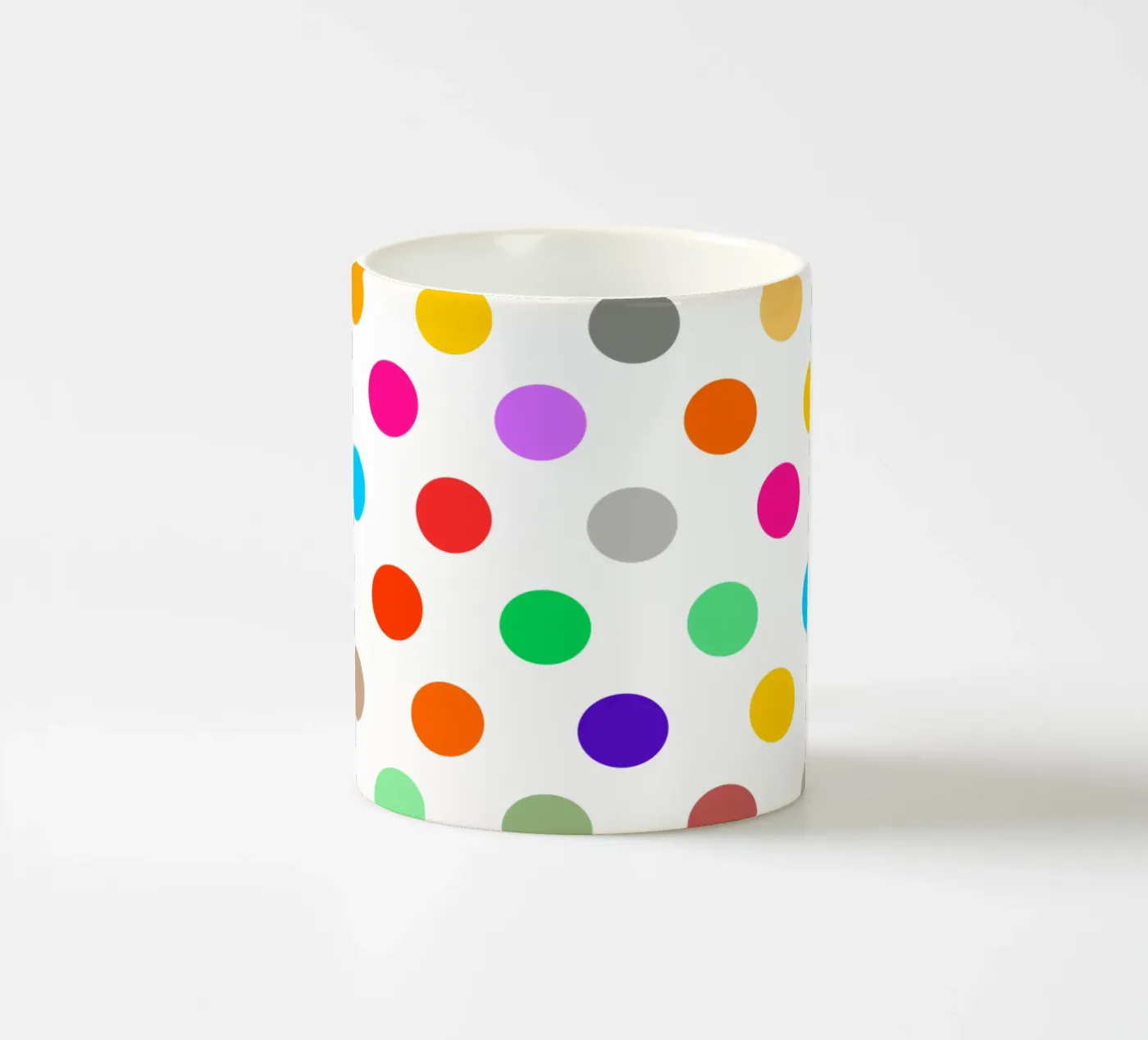 Bright polka dot pattern ceramic mug by baobabprintstore