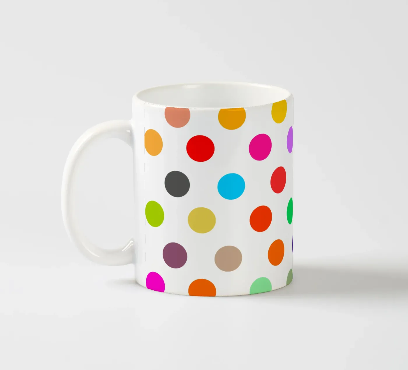 Bright polka dot pattern ceramic mug by baobabprintstore