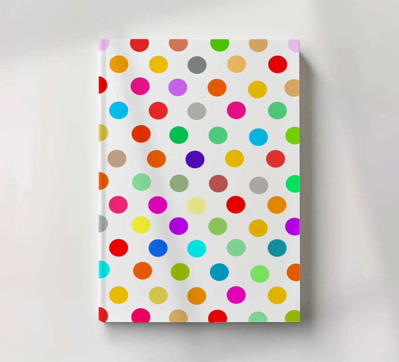 Bright polka dot pattern notebook by baobabprintstore