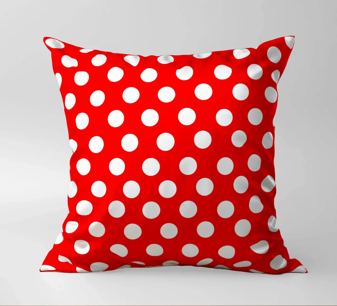 Red polka dots pattern decorative cushion by baobabprintstore