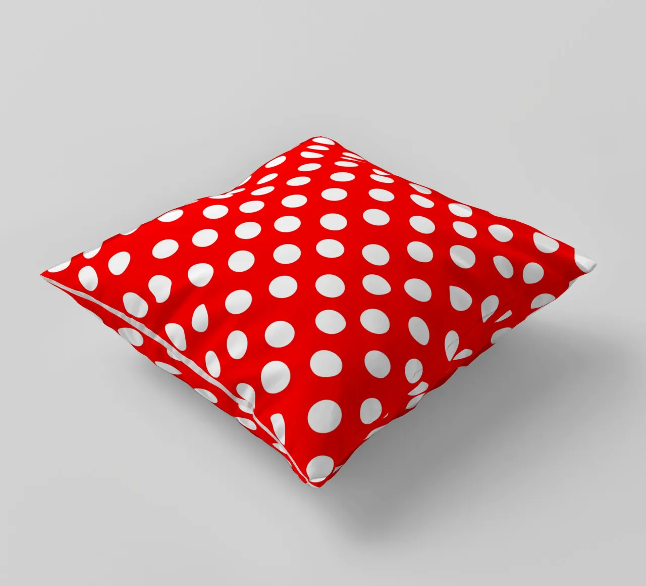 Red polka dots pattern kussen van baobabprintstore